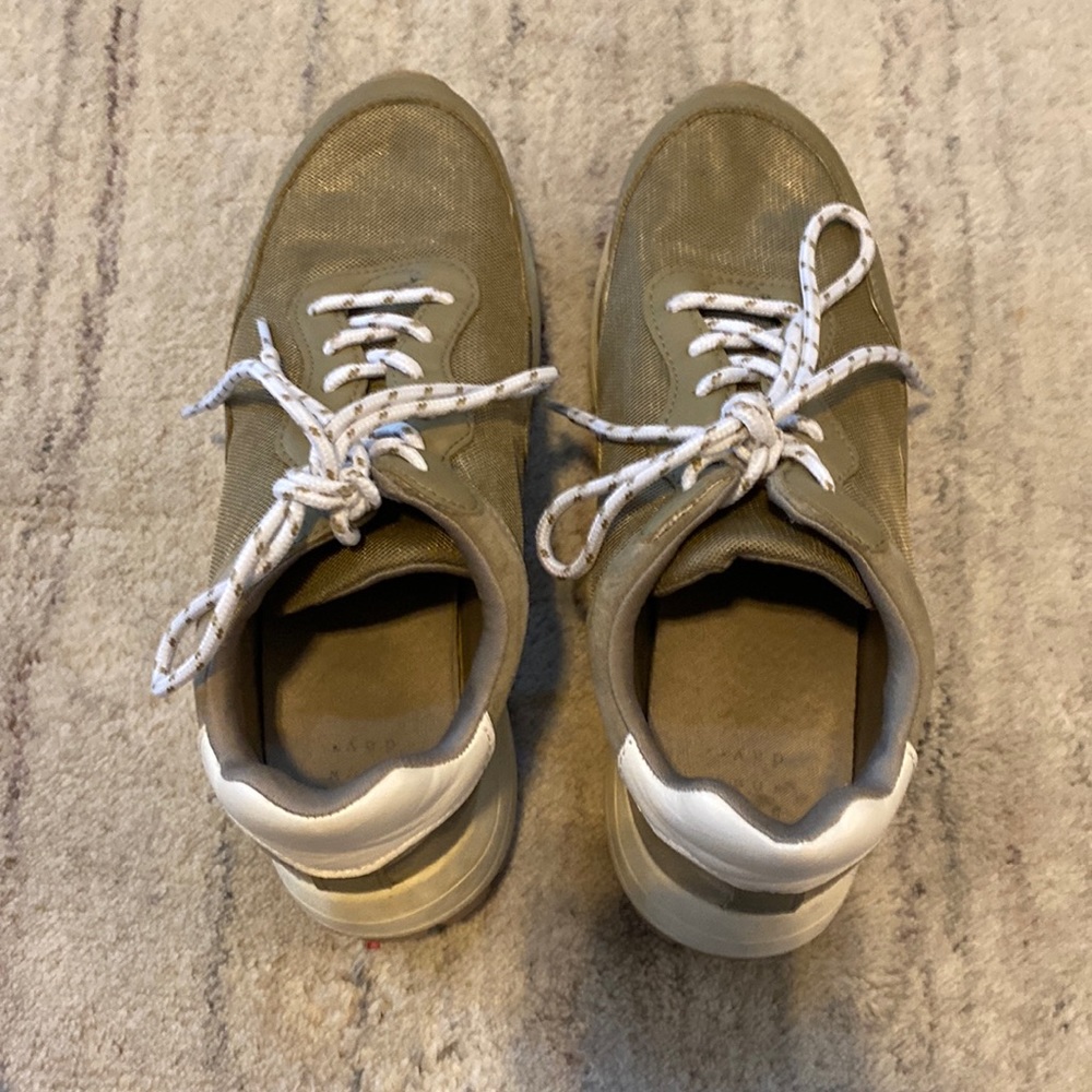 Muted green tennis shoes
